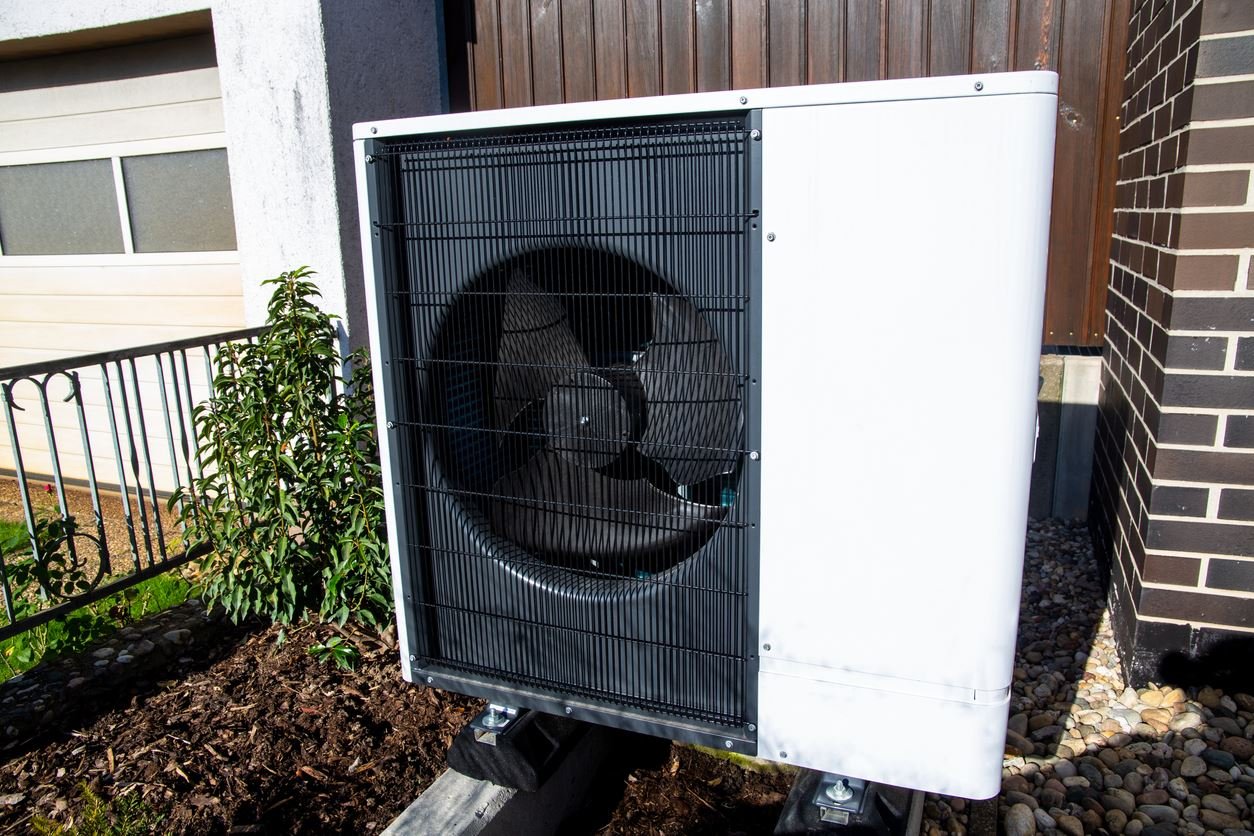 Air and water heat pump on a residential home