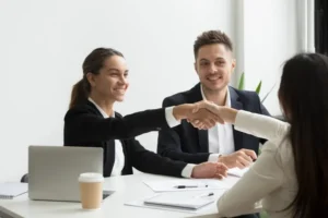 Candidate handshaking with the interviewer