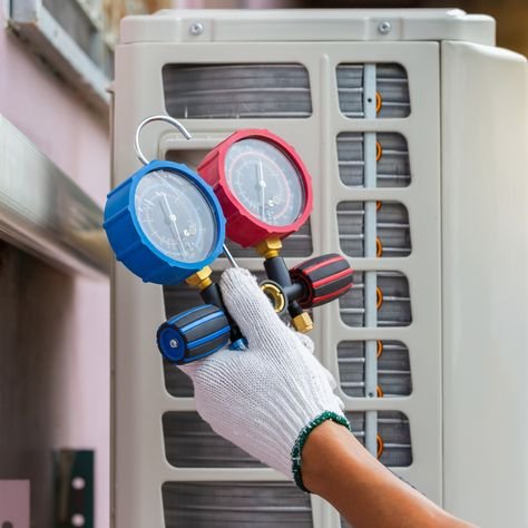 Certified technicians installing a high-quality AC unit for maximum cooling performance.