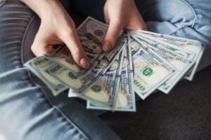 counting money loaned