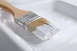 paint brush with white paint